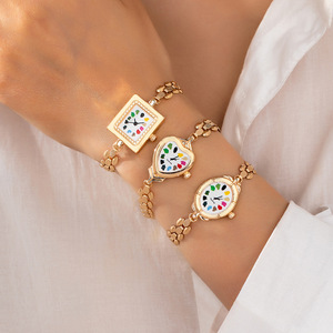<span class=keywords><strong>DW</strong></span>-34 สร้อยข้อมือแฟชั่นปรับได้ รูปทรงนาฬิกา ทำจากโลหะผสมสีทอง - Product Image 1