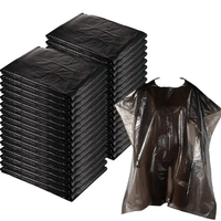 Capas de salón de plástico baratas PE corte de pelo bata de peluquería capa desechable de peluquero negro