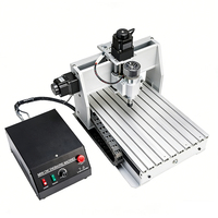 Machine de gravure CNC 2 en 1 3040 avec changeur d'outils rotatif pour travaux d'art métallique DIY
