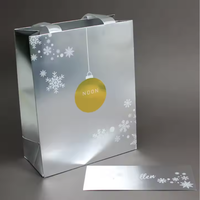 Cadeau en gros de luxe à vendre sac à provisions ruban de papier enduit poignée emballage recyclable OEM montre bijoux lunettes