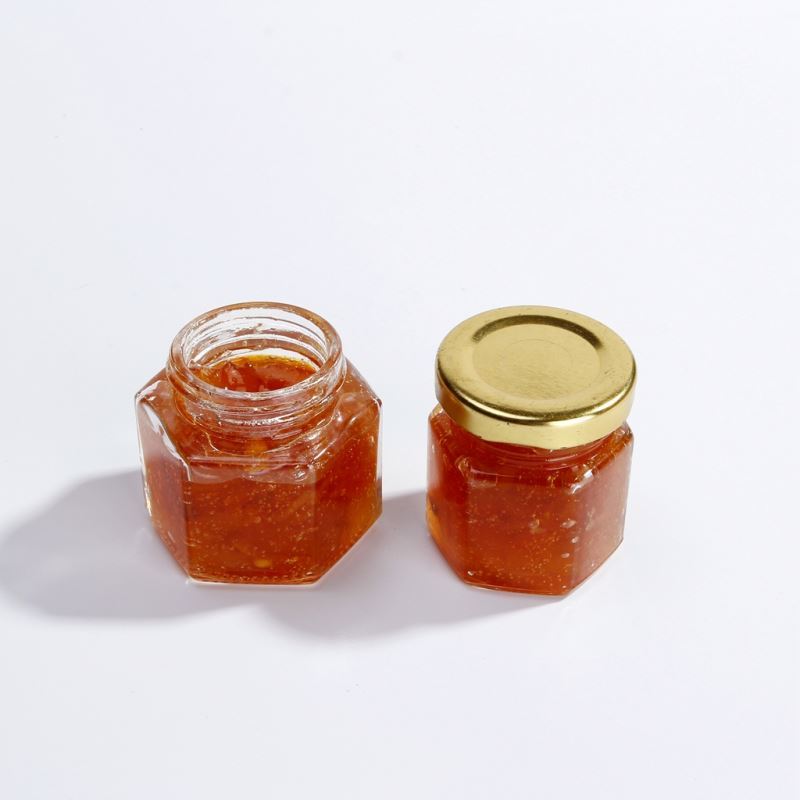 Оптовая продажа 50g 100g 200g 250g 500g 1000g шестиугольная стеклянная бутылка для массовых грузов мед стеклянную банку банки бутылки