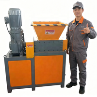 Broyeur compact mini à double arbre pour la déchiquetage des seaux de peinture usagés, des rebuts d'aluminium, des copeaux d'acier, et les petits objets ménagers