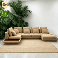 Ensemble de canapé sectionnel en tissu en forme de L avec chaise longue d'angle, coussins de dossier et base en bois, mobilier minimaliste pour salon de villa