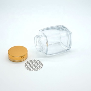 50ml 100mL 180ml 280ml 360ml 750ml Botella de miel de vidrio de forma cuadrada única Proveedor de tarros con tapa dorada utilizada para mermelada de pudín de miel - Product Image 6
