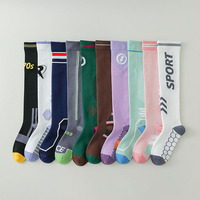 Chaussettes de compression sportives professionnelles pour femmes, nouvelle conception OEM, hauteur genou, couleur unie, mélange de coton, séchage rapide