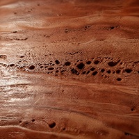 Table basse sculpturale en travertin rouge de qualité supérieure