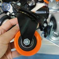 Roulette rotative WBD avec frein noir, plaque de fixation, dimensions, caoutchouc thermoplastique orange, roue avec roulement à billes