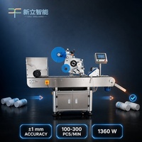 Machine d'étiquetage automatique électrique horizontale avec séparateur pour flacons, canettes et petits cylindres (application cosmétique)