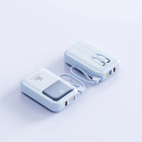 Nouvelle mini batterie externe en plastique 66W à charge ultra-rapide 20 000mAh avec câble intégré PD 20W, charge rapide bidirectionnelle, chargeur portable
