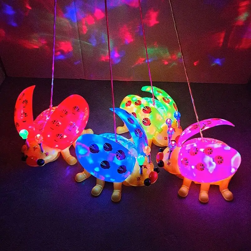 Hot Selling Colorful Durable toys for Children Electric LED Ladybug Toys with Music Traction Flash Toys