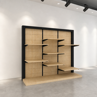 Étagère murale en bois à 3 colonnes décalées, sur mesure, pour la présentation de vêtements pliés en magasin, usage commercial