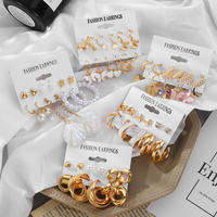 Nouvel ensemble de boucles d'oreilles créoles géométriques plaquées or tendance 2023 avec perles et pierres de cristal de luxe pour femme, idéal pour les soirées