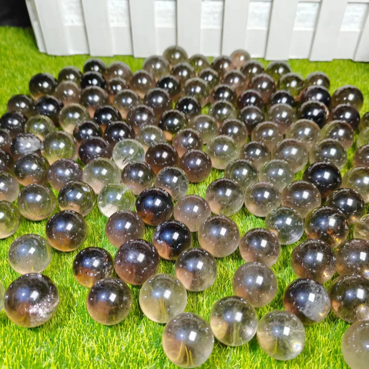 Bolas de cristal de esfera pequeña de cuarzo ahumado talladas a mano al por mayor de cristal natural para decoración del hogar