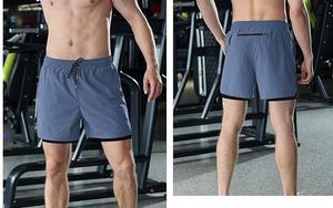 Shorts de sport pour hommes en toile, couleur unie, imperméables, séchage rapide, taille élastique, pour musculation, course à pied et jogging - Product Image 5