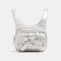 Sac à dos en PU avec nœud pour femme, nouvelle collection été 2024, petit sac de voyage haut de gamme à bandoulière unique avec chaîne, fermeture éclair