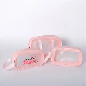 Bolsa de maquillaje cosmético de PVC Rosa impermeable con asa y logotipo personalizado para mujer, bolsa de baño de lavado con cremallera de corazón para viaje