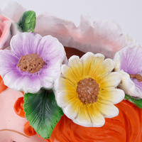 Redeco Pot de plante à tête féminine fantaisiste orné d'une couronne de fleurs colorées Pot décoratif artistique pour la maison Pot de fleur en résine