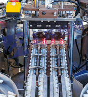 Machine d'assemblage de couvercle supérieur de cylindre de bouteille de perfusion pour bébé