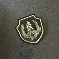 Vente en gros Étiquette de transfert de chaleur métallique 3D Tpu brillante personnalisée Vêtements de sport de football Maillot Tpu Patch de football Badge Tpu
