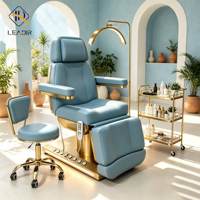 Lit de beauté électrique de luxe à base dorée avec 3 moteurs, table de massage facial réglable pour spa