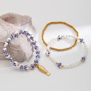 <span class=keywords><strong>Bracelet</strong></span> de charme en perles de porcelaine bleue et blanche, plaqué <span class=keywords><strong>or</strong></span> 18 carats, en acier inoxydable, imitation perle, pour femmes, bijoux - Product Image 3