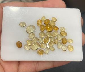 พลอยซิทรีนธรรมชาติเจียระไนเป็นรูปไข่สีเหลืองอ่อน - Product Image 1