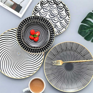 Platos de cerámica negros modernos de calidad alimentaria, platos de cena nórdicos con girasol de 10 pulgadas, precio barato