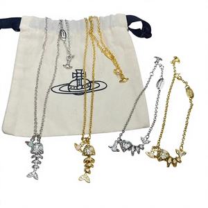 Conjunto de Collar y Pendientes de Cadena de Bambú y Cobre con Colgante de Espina de Pescado Pequeña, Estilo Imperio de la Emperatriz Saturna 2024, Unisex - Product Image 1