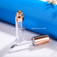 Tubes de brillant à lèvres de 9ml avec gros pinceau métallique emballage cosmétique contenant de baume à lèvres transparent logo personnalisé