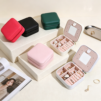 Organisateur de bijoux de voyage à fermeture éclair portable en gros Boîte de rangement en cuir PU faite à la main avec miroir pour boucles d'oreilles colliers bagues