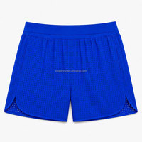 Shorts de sport légers et sans coutures pour hommes, perforés, séchage rapide, respirants, pour la course et la gym, avec design à jambes fendues, personnalisables OEM