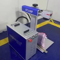 Mesin penanda laser STJ-50F mesin ukir laser mesin ukiran laser Harga logam mesin pengukir laser untuk perhiasan uv /co2 /fly