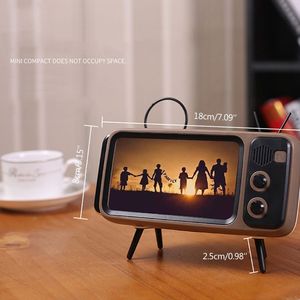 Supporto universale per telefono da tavolo Retro TV altoparlante bluetooth supporto per telefono cellulare TV retrò - Product Image 1