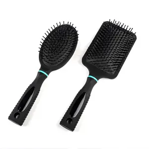 Brosse à cheveux pagaie ronde et noire, en plastique, carrée, personnalisée, bonne viscosité l'air - Product Image 1
