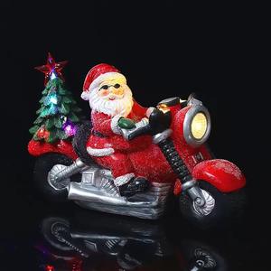 Adornos de Ambiente Navideño con Luces LED de Colores y Música: Santa Claus Conduciendo una Motocicleta en una Escena Nevada - Product Image 4