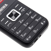 Téléphone mobile chinois UNIWA E1802 avec écran de 1,8 pouce, double SIM, batterie de 1800 mAh, lampe torche et appareil photo
