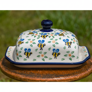 Beautéuse en céramique à motif d'abeille bleue et jaune avec de petits accents floraux, disponible à prix de gros. - Product Image 1