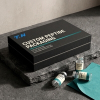 Boîte rigide personnalisée en carton gris avec couvercle noir mat pour flacons de peptides, avec doublure en éponge, impression offset et sérigraphie, soins personnels