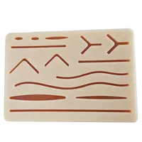 Coussinet de suture en silicone à simulation élevée, kit de formation à suture médicale, modèle de peau traumatique humaine