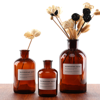 Récipient en verre ambré personnalisé de 200ml 500ml bouteille ronde de diffuseur de roseau d'arôme extra large ventre avec emballage de boîte d'accessoires