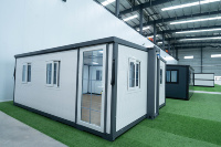 Conteneurs pliables et extensibles de 20 pieds, structure en acier personnalisée, panneaux en laine de roche, certifiés CE ISO pour hôtel, maison modulaire