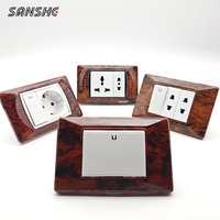 Interrupteurs muraux modulaires DIY SANSHE CE type 118 à grain de bois et prises de courant Schuko françaises et allemandes pour projets hôteliers et résidentiels de design
