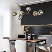 Lustre suspendu en verre LED de couleur or, design moderne et luxueux, fabriqué sur mesure par DLSS, avec structure en fer, pour salon et maison.