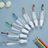 Bouteille de voyage de sport transparente en PETG de 60ml avec bouchon supérieur à rabat Bouteille de désinfectant pour les mains portable sans lavage Anneau Boucle Crochet Conception