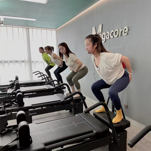 Megacore High-end fabrika doğrudan ticari Pilates Reformer stüdyo Reformer Pilates Yoga Fitness Pilates Reformer makinesi