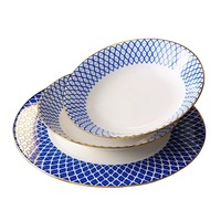 Service de table en porcelaine de luxe, motif géométrique bleu, bord doré, assiettes, bols, mariage, hôtel, style européen élégant