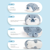 Coussin en peluche mignon en forme de loutre de mer couchée, doux, en forme d'animal, pour le sommeil, jouet, vente en gros, fabricant sur mesure, cadeau pour enfants