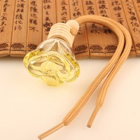 Diffuseur d'huile essentielle de parfum de voiture suspendu en forme de rose de 6ml bouteille en verre d'aromathérapie bouteille de désodorisant de voiture avec couvercle en bois