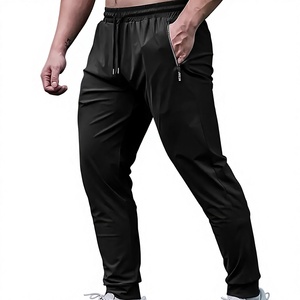 Pantalon de course pour homme en soie glacée, séchage rapide, pour l'entraînement et le fitness, avec poche zippée, coupe athlétique basse, respirant, pour la gym, style décontracté élégant - Product Image 1