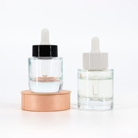Bouteilles en verre à fond épais d'apparence délicate 30Ml 50Ml Essence de soins de la peau à épaule plate bouteilles cylindriques d'huile essentielle transparentes compte-gouttes